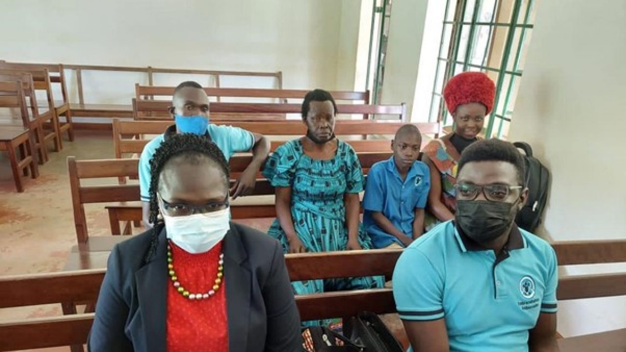Perez Mwase and his family members in court during the hearing of case